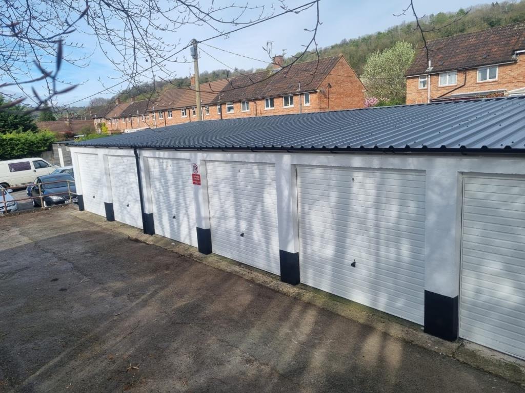 Lot: 114 - TEN REFURBISHED LOCK-UP GARAGES - General view of garages rear of 66 Pitman Place